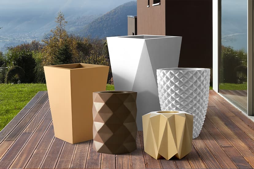 5 designer garden planters  placed besides each other