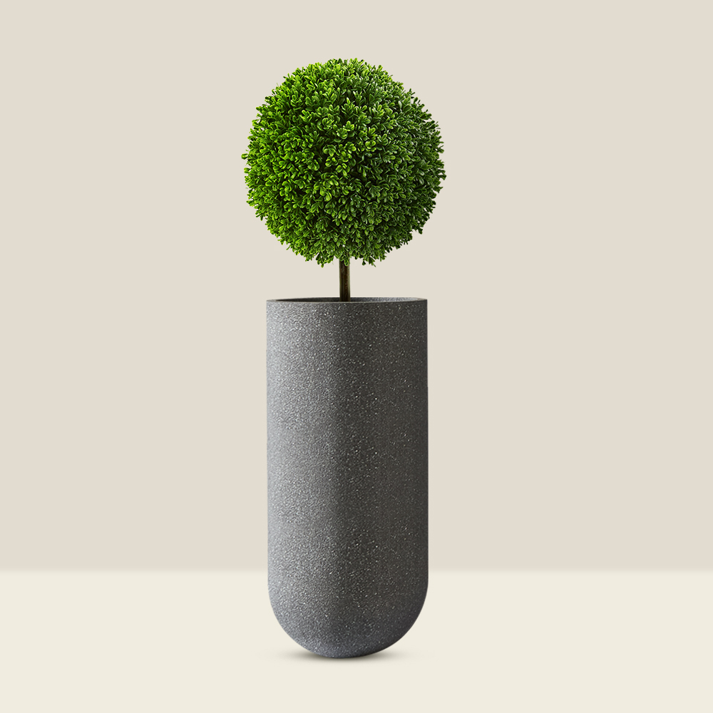 designer pots for plants from Bonasila. Leppo planter in grey colour and rustic finish.